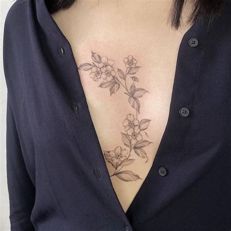 inbetween breast tattoos|Sternum Tattoo Ideas That Will Make You Want A Tattoo。